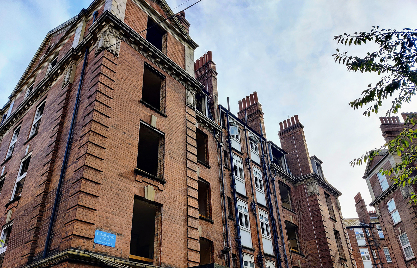 A photo of the Sutton Estate with the old windows removed, during the regeneration process.